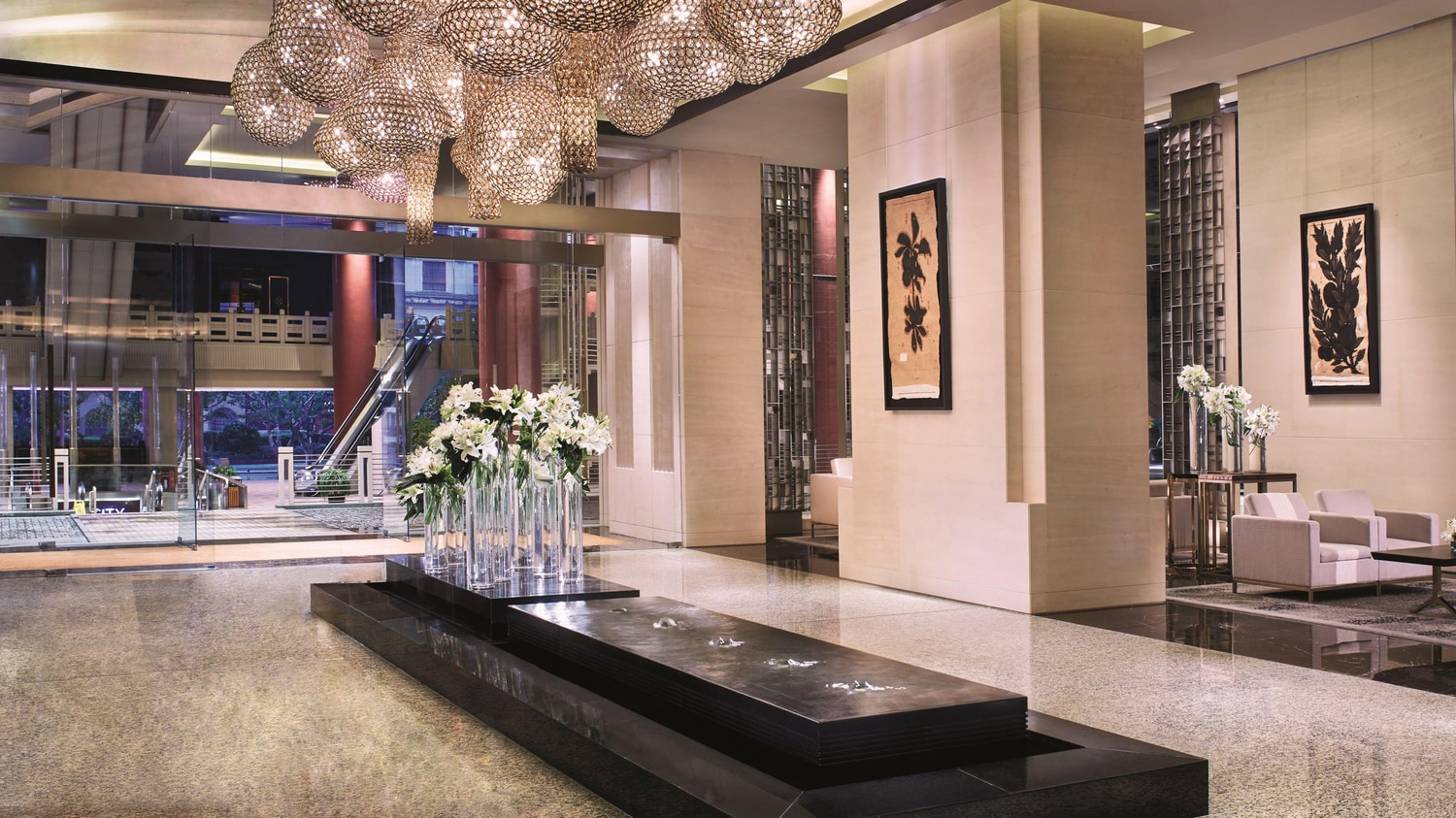 Project photograph of a coordinated hospitality arrival lobby.