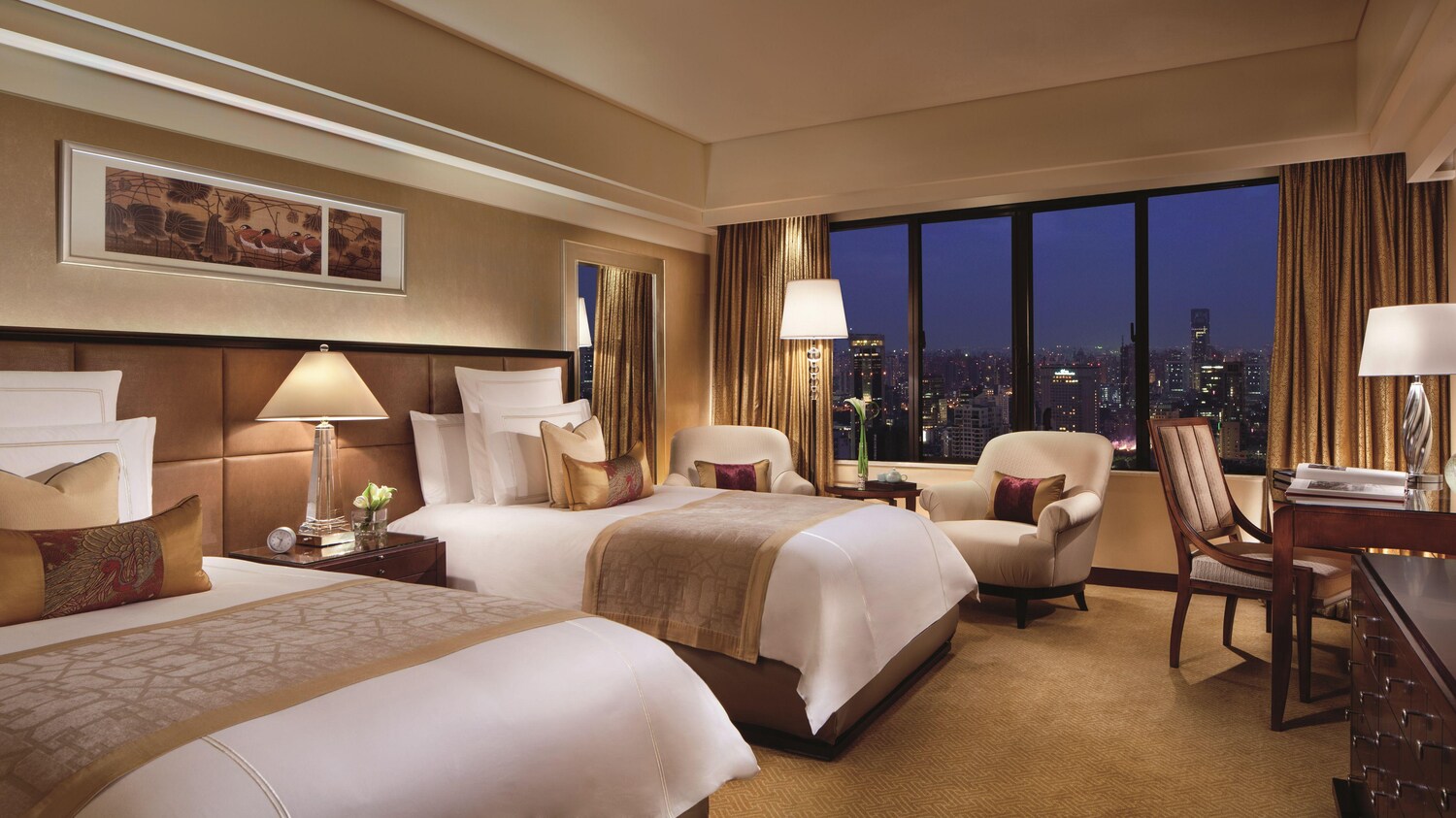 Project photograph of a coordinated high-rise hospitality guest room.